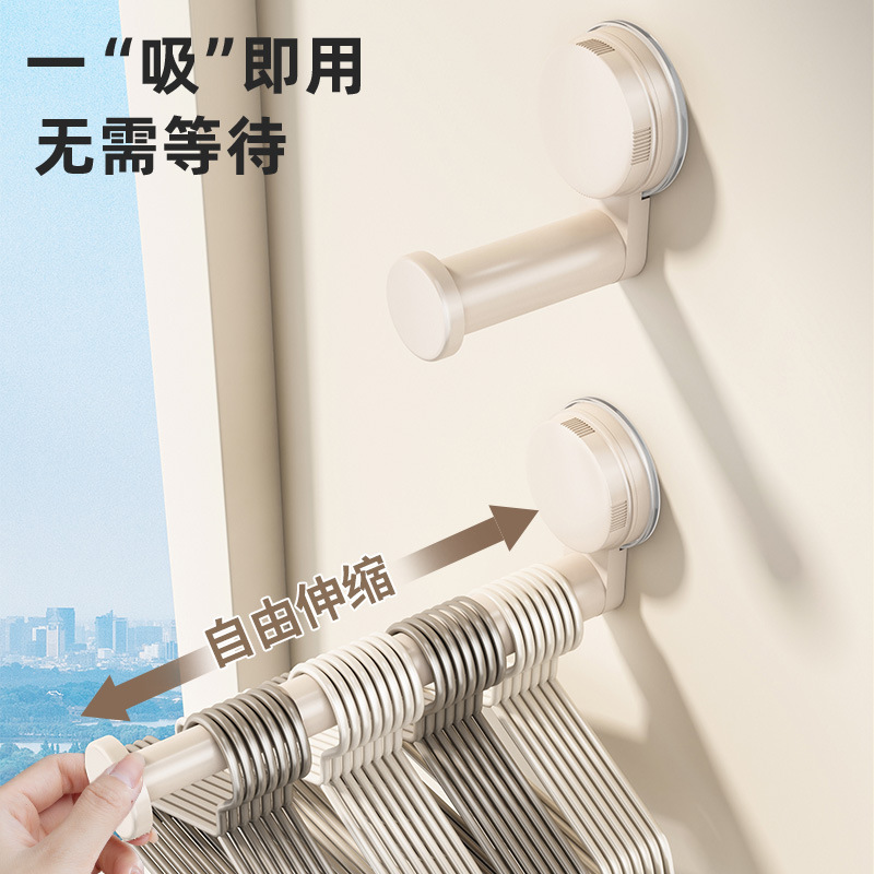 吸盤衣架收納神器家用陽臺多功能伸縮免打孔無痕掛衣架子牆上壁掛